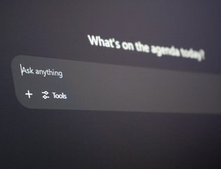 Computer screen with 'What's on the agenda today?' and texbox 'Ask anything...'